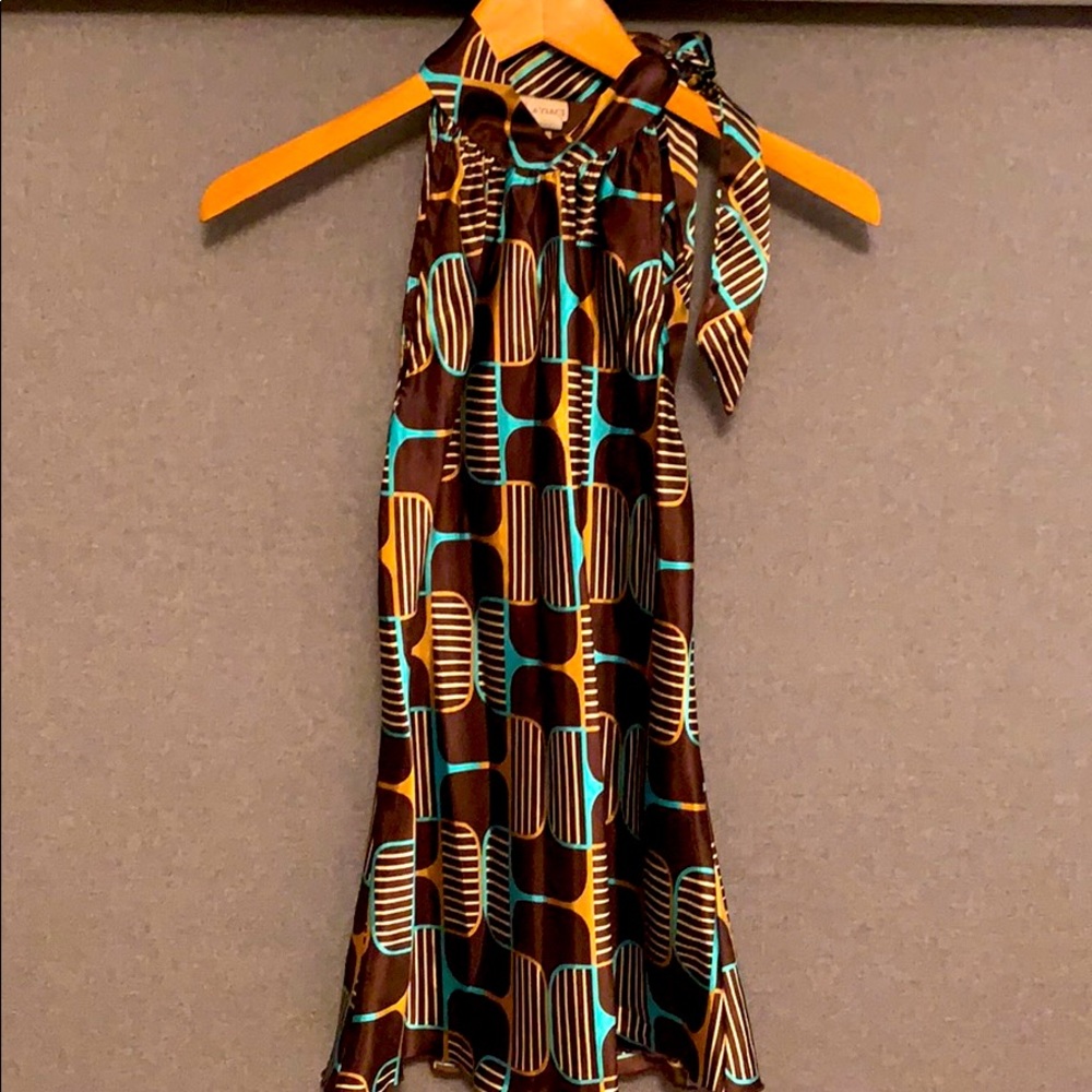Vibrant colored blouse.